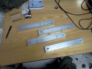 Links cut and drilled.