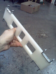 Leg with brackets for rollers.